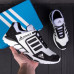 Білі шкіряні чоловічі кросівки Adidas